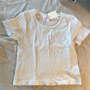 Aura white, short top.  Material is thicker than a t-shirt.